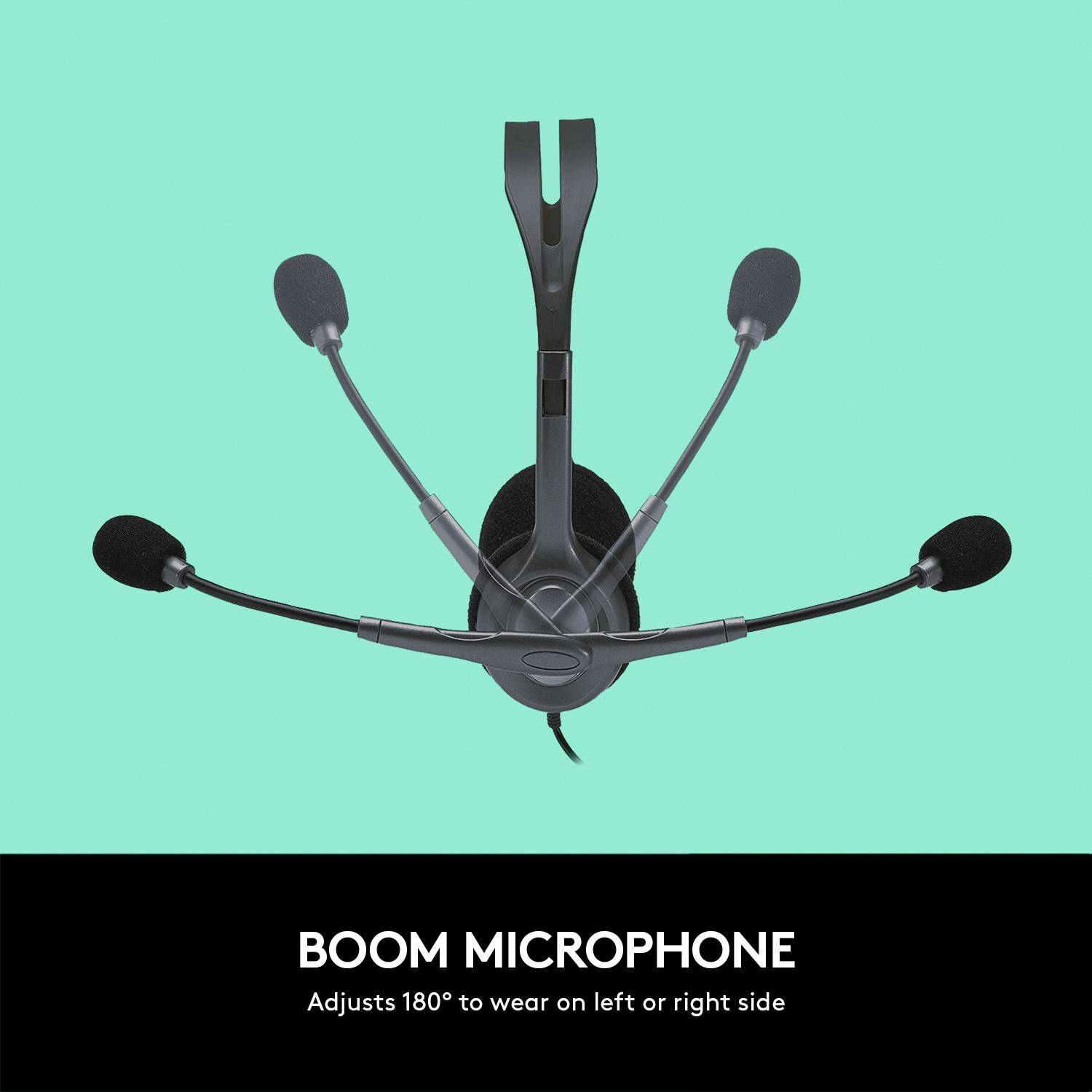 Un casque avec quatre bras de microphone et des écouteurs en noir. Vue de dessus, fond neutre.