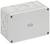 Boîtier rectangulaire en plastique gris avec plusieurs découpes rondes sur les côtés. Adapté pour les installations électriques.