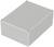 Boîtier rectangulaire gris aux coins arrondis, doté de quatre vis aux angles, placé sur une surface blanche.