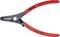 Pince à circlips Knipex rouge avec articulation grise, adaptée pour circlips de 19-60 mm, fabriquée en Allemagne.