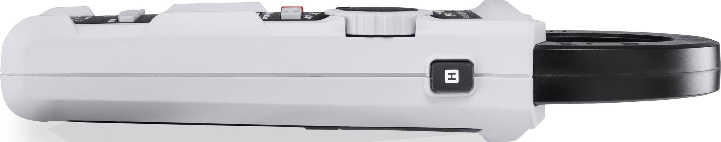 Un scanner à main gris numérique avec une tête de lecture noire et des éléments de commande, dont un grand bouton rotatif sur le dessus de l'appareil.