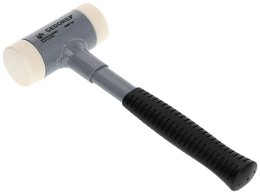 Marteau en caoutchouc à tête grise et manche noir. Outil permettant de frapper délicatement sans endommager la surface.