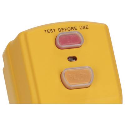 Gros plan d'un dispositif de test jaune avec le texte « TEST BEFORE USE » (TESTER AVANT UTILISATION), un voyant lumineux rouge et un bouton « RESET » (RÉINITIALISER).