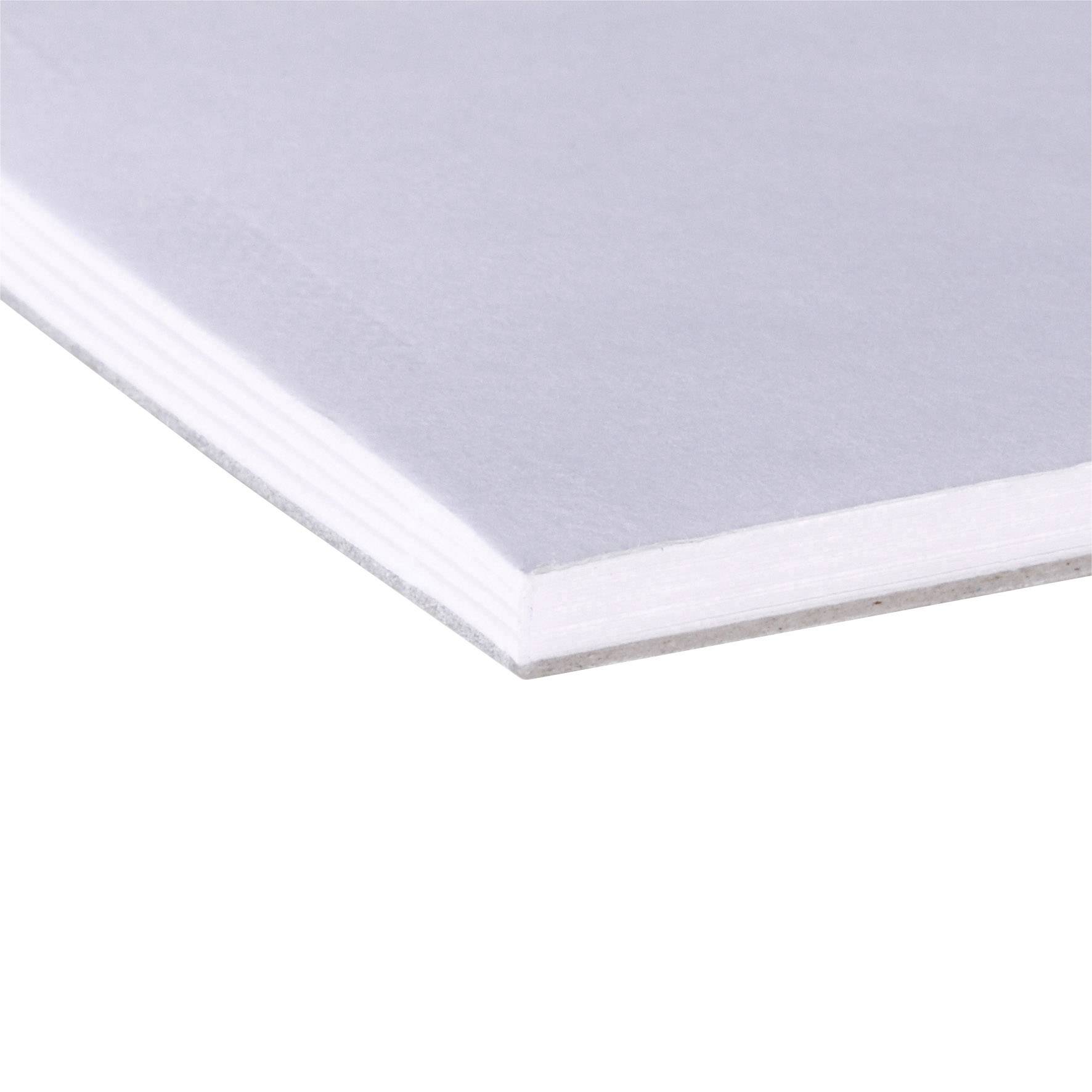 Gros plan sur une plaque de plâtre blanche. On observe un bord droit et lisse, ainsi que le fin revêtement sur sa surface.