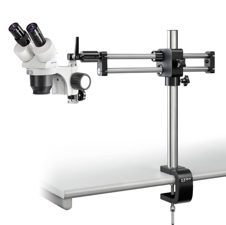 Microscope monté sur un support ajustable, fixé à une table. Idéal pour des travaux de laboratoire précis ou des inspections.