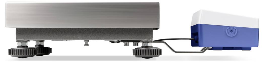 Un dispositif métallique équipé de deux roues noires et d'un boîtier bleu sur le côté. Utilisé pour des applications de laboratoire ou industrielles.