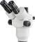 Microscope stéréoscopique blanc à deux canaux avec bouton de commande noir ; adapté pour des observations scientifiques détaillées.