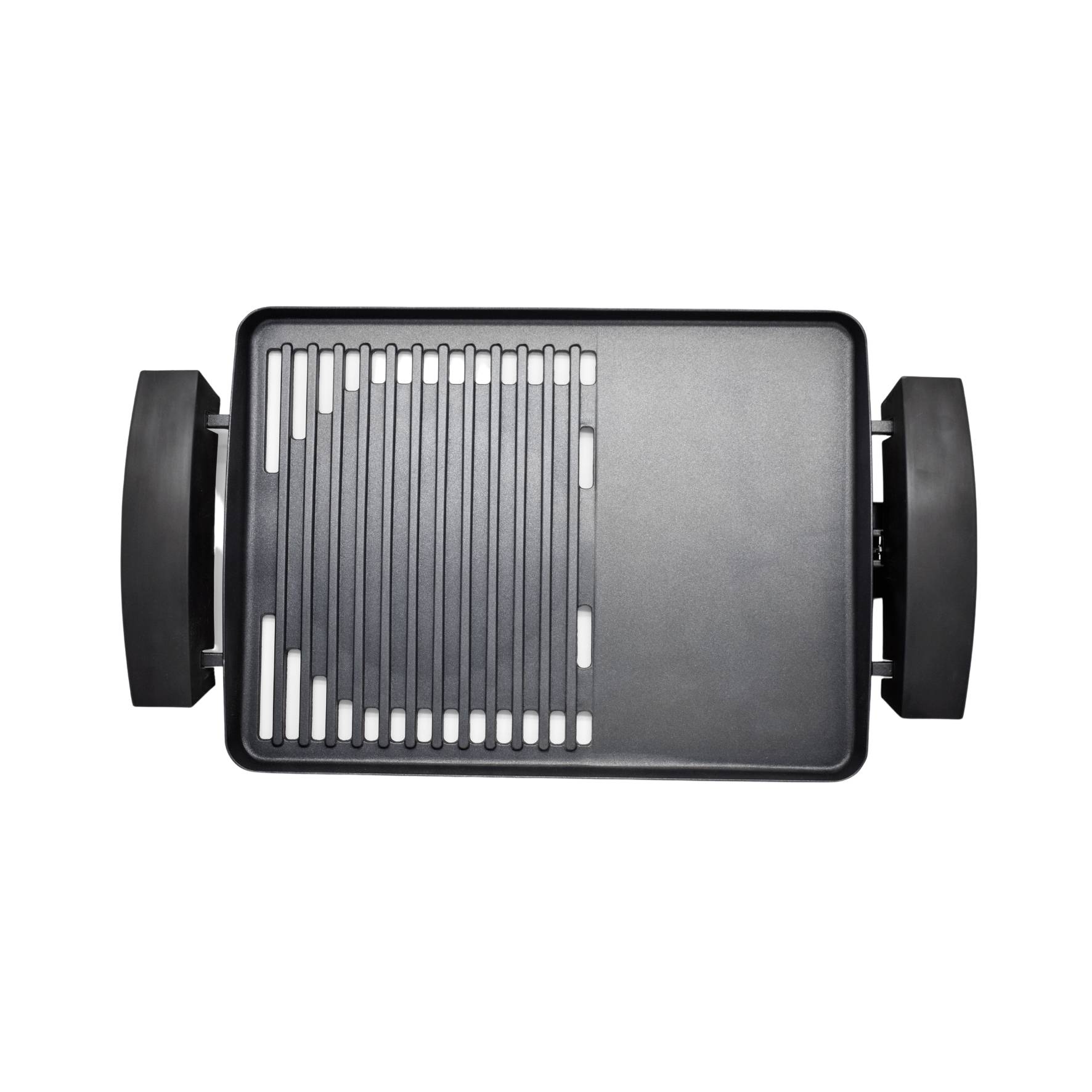 Une plaque de grill noir avec surface lisse et striée, adaptée à différentes méthodes de préparation des aliments.