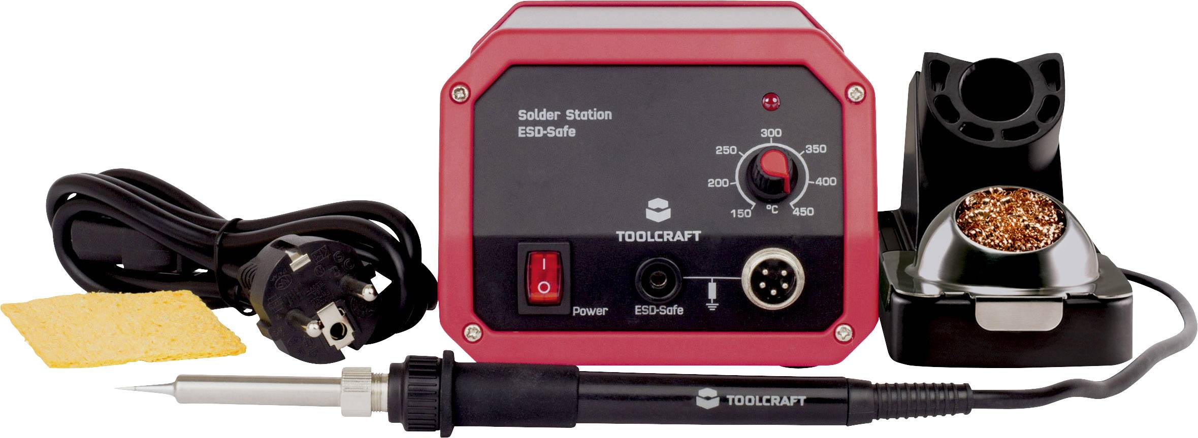 Station de soudage comprenant un fer à souder, un câble, une éponge de nettoyage et un support. L'affichage montre un régulateur de température et des témoins lumineux.