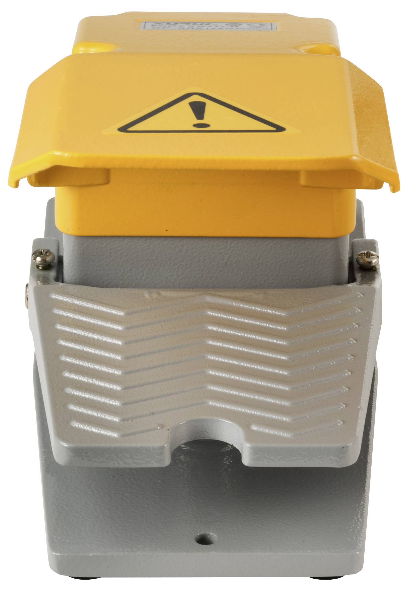 Pédale de commande avec capot de protection jaune et symbole d'avertissement. Plateforme grise antidérapante, utilisée pour la commande de machines.