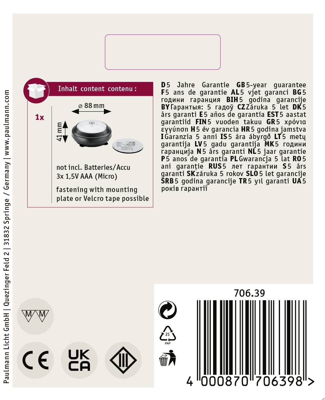 'Emballage de produit avec mentions de garantie en plusieurs langues, symboles pour batteries et certificats requis, code-barres visible.'