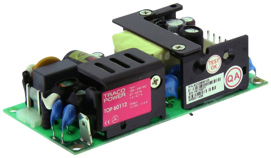 Un module d'alimentation à découpage portant l'inscription 'TRACO POWER TOP 60112', montrant divers composants électroniques et des étiquettes de test 'Test OK'.