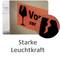 Un carton étiqueté présente un symbole de verre à vin brisé avec le texte 'Fragile' en dessous. Au-dessous, un texte indique : 'Forte luminosité'.