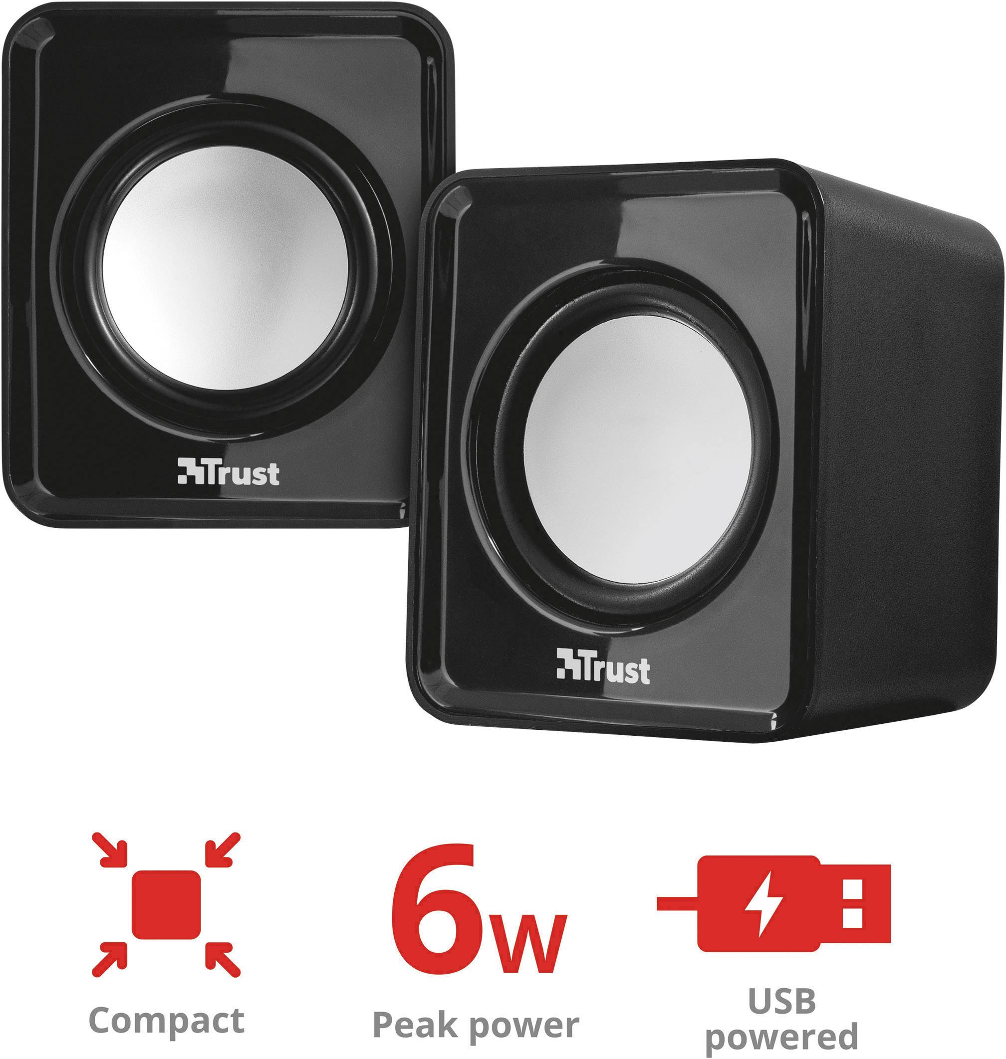 Enceintes compactes Trust avec une puissance de crête de 6W et alimentation USB, présentées avec des boîtiers noirs et des grilles d'enceintes argentées.