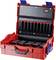 Boîte à outils rouge avec couvercle ouvert, montrant plusieurs poches bordées de rouge pour le rangement des outils.