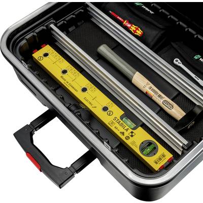 Boîte à outils ouverte avec différents outils, y compris un niveau à bulle, un marteau et des clés à molette, soigneusement disposés.