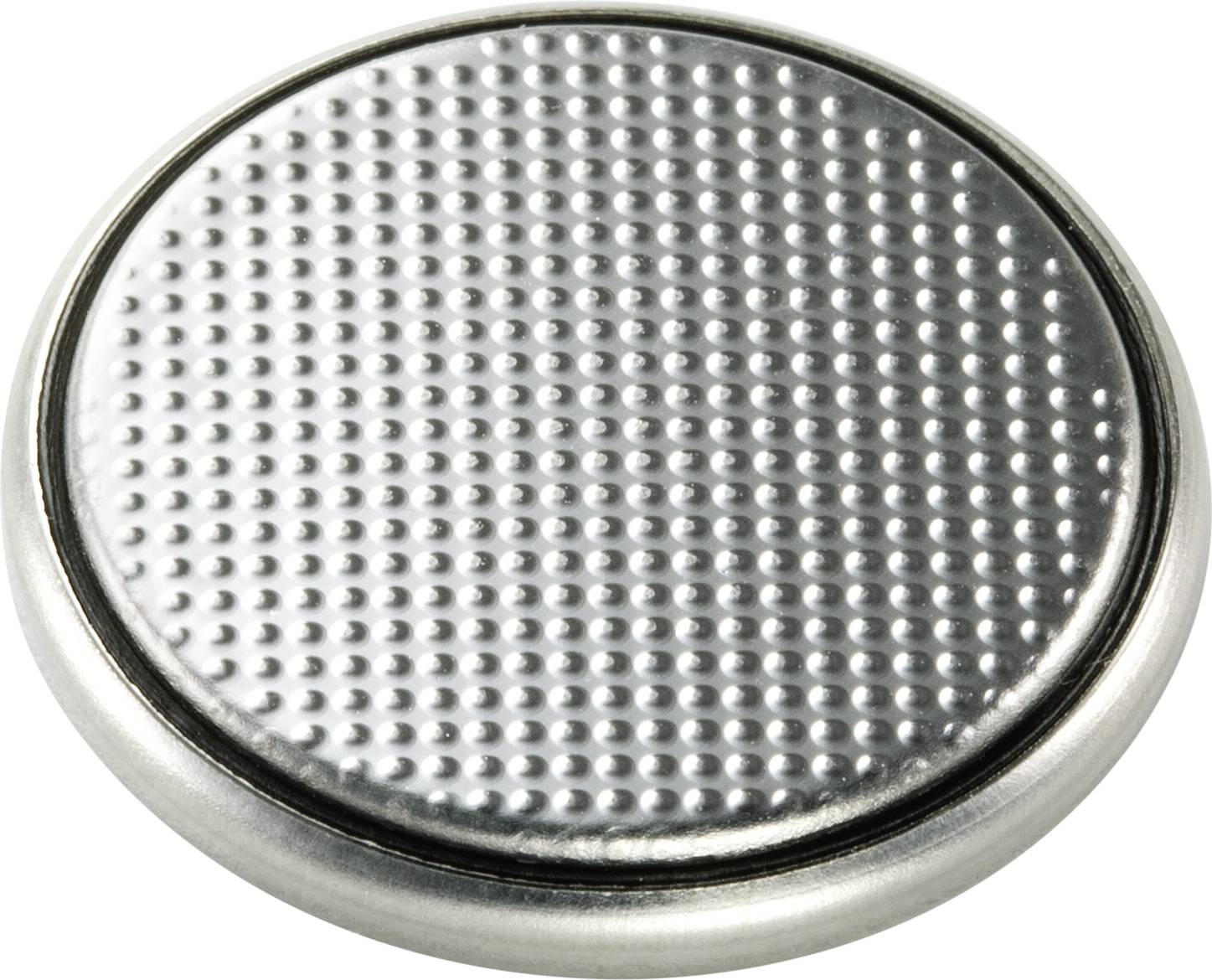 Pile bouton en argent à surface structurée, souvent utilisée dans les montres et les petits appareils.