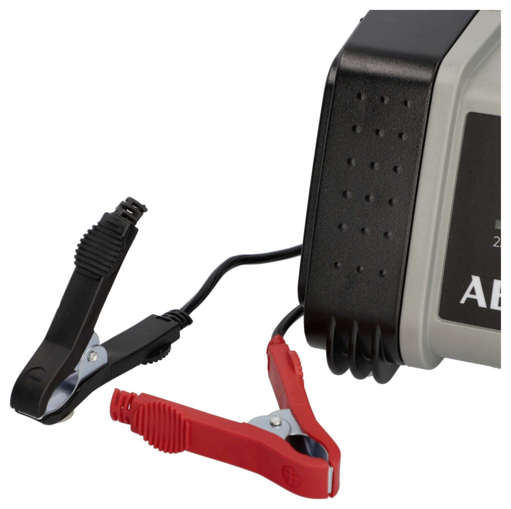 Un chargeur de batterie équipé de pinces crocodiles noires et rouges, utilisé pour charger les batteries de véhicules automobiles.