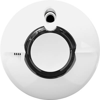 Un détecteur de fumée blanc avec un cercle noir au centre, installé au plafond.