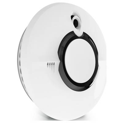 Un détecteur de fumée rond blanc avec un anneau noir central, monté au plafond. Il sert à détecter la fumée et à avertir en cas d'incendie.