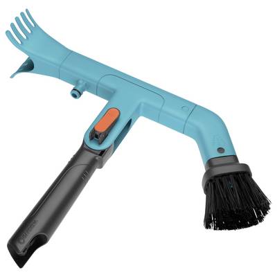Outil de nettoyage avec une poignée en plastique bleu, une brosse noire et un bouton orange, conçu pour nettoyer les coins et les joints.