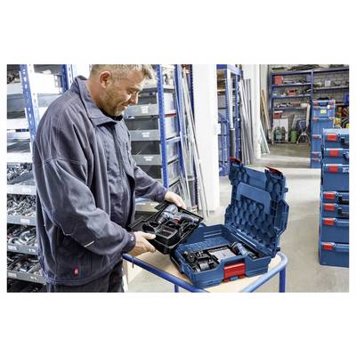 Meuleuse d'angle Bosch Professional bleue avec poignée latérale et disque de coupe, présentée sur un fond blanc.