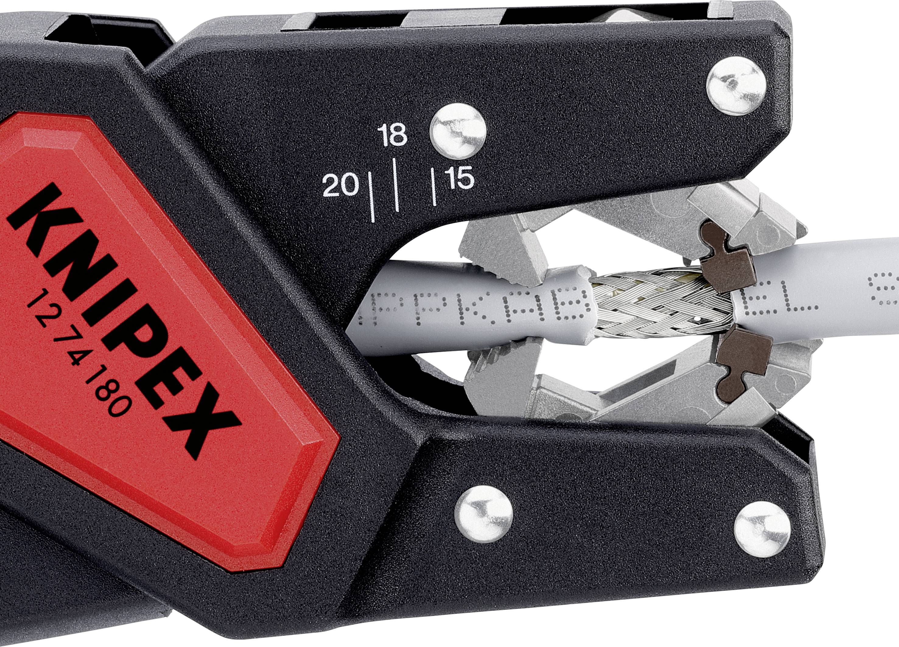 Un outil de dénudage de la marque KNIPEX permet de dénuder l'isolation d'un câble, échelle de 15 à 20 mm, avec des poignées rouges et noires.