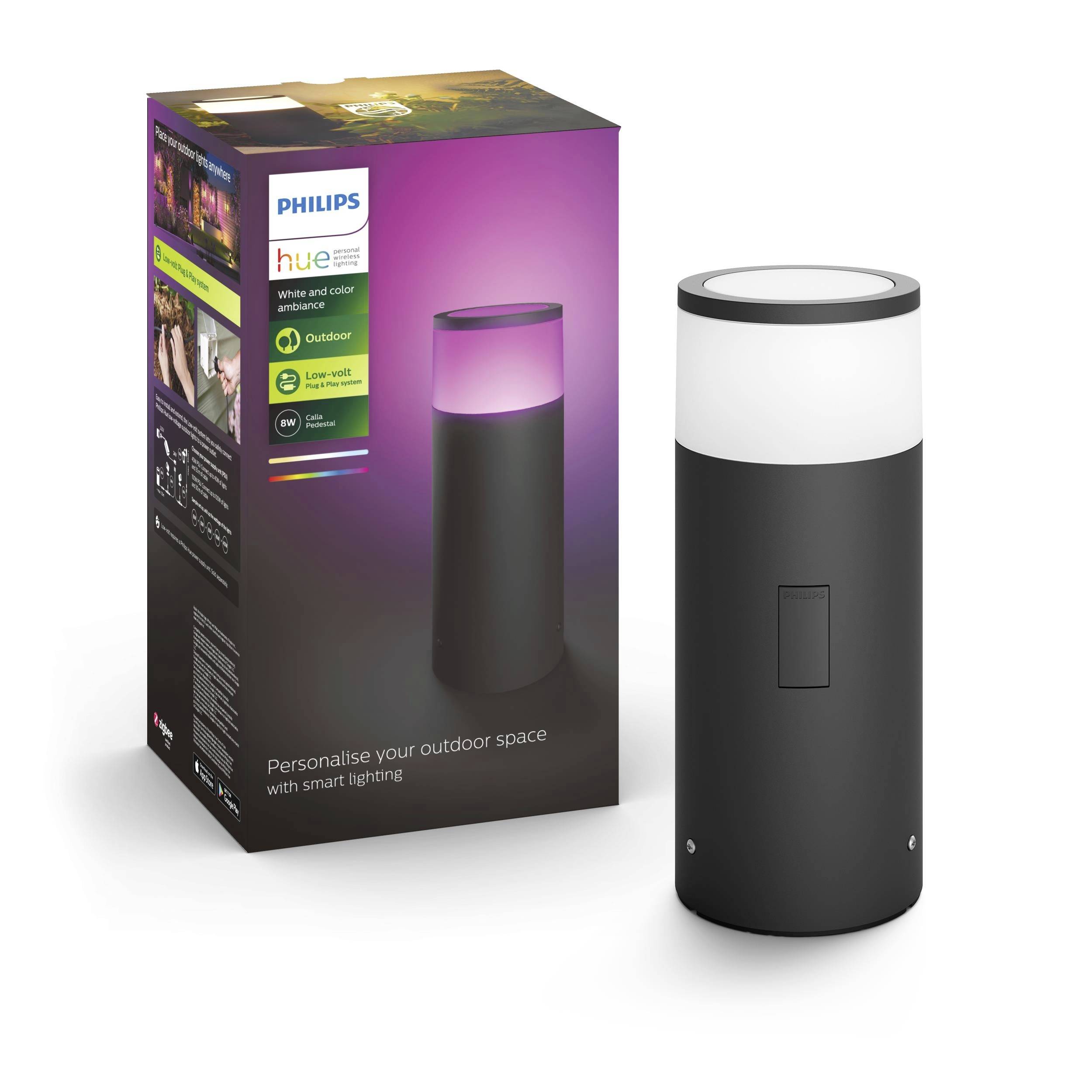 Emballage et produit de la lampe d'extérieur Philips Hue. La lampe présente un design moderne avec un boîtier blanc et noir. L'emballage présente les options d'éclairage.