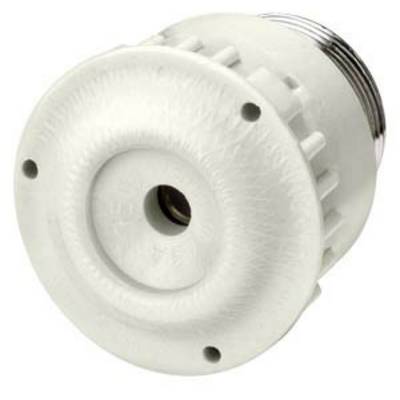 Une pièce en plastique blanc de forme circulaire, avec un bord strié et une ouverture centrale.