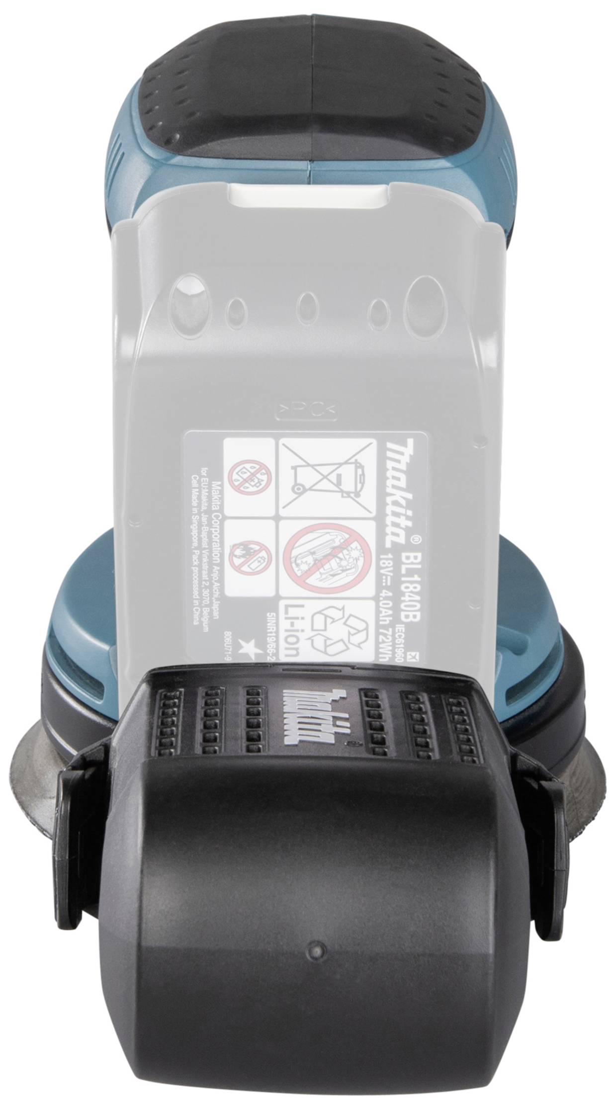 Perceuse-visseuse Makita à batterie avec batterie retirée. Étiquette d'avertissement visible dans le logement de la batterie.