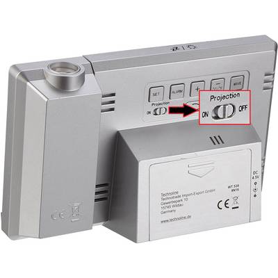 Horloge de projection en argent. L'accent est mis sur l'interrupteur à bascule pour la fonction de projection, avec l'indication « Projection ON/OFF ».