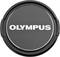 Couvercle d'objectif Olympus avec l'inscription 'OLYMPUS' en lettres blanches sur fond noir.