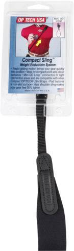 Système de transport 'OP/TECH USA Compact Sling' dans son emballage. Il montre une personne utilisant ce système de transport pour réduire le poids lors du transport d'appareils photo.