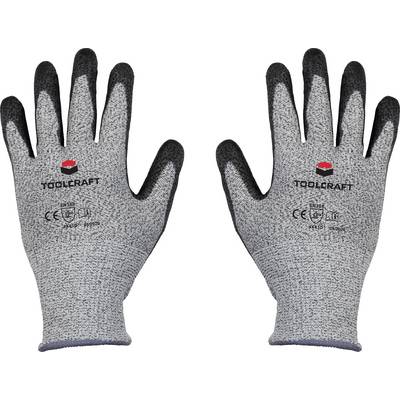 Gants de travail gris de Toolcraft avec l'intérieur noir, marquage CE visible. Adaptés aux travaux mécaniques.