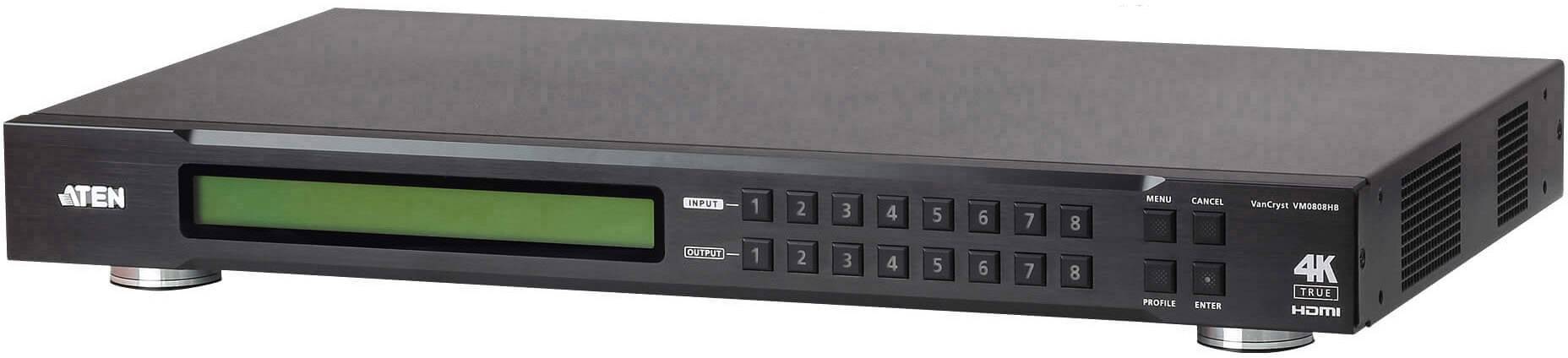 Un appareil répartiteur audio/vidéo noir avec plusieurs touches d'entrée et de sortie sur la façade, comprenant un écran d'affichage. Compatible avec les connexions HDMI 4K.