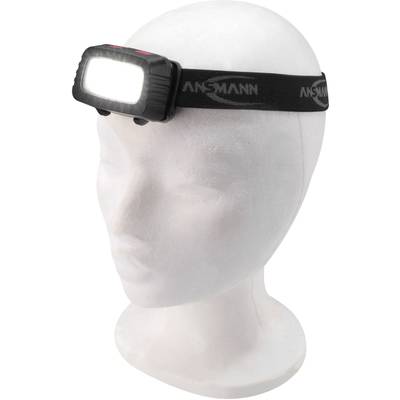Tête de mannequin avec lampe frontale éclairée d'Ansmann.