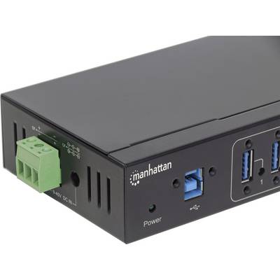 Un adaptateur noir avec plusieurs ports USB et un port vert sur le côté. Marquage 'manhattan'.