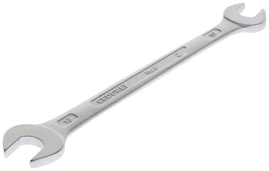 Une clé à double fourche en argent de 21 mm et 23 mm, légèrement inclinée sur une surface blanche.
