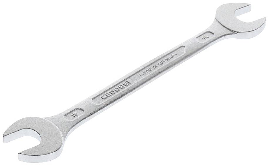 Une clé à fourche en argent avec deux tailles de mâchoires différentes à chaque extrémité, l'une pour les vis de 15 mm et l'autre pour les vis de 17 mm.