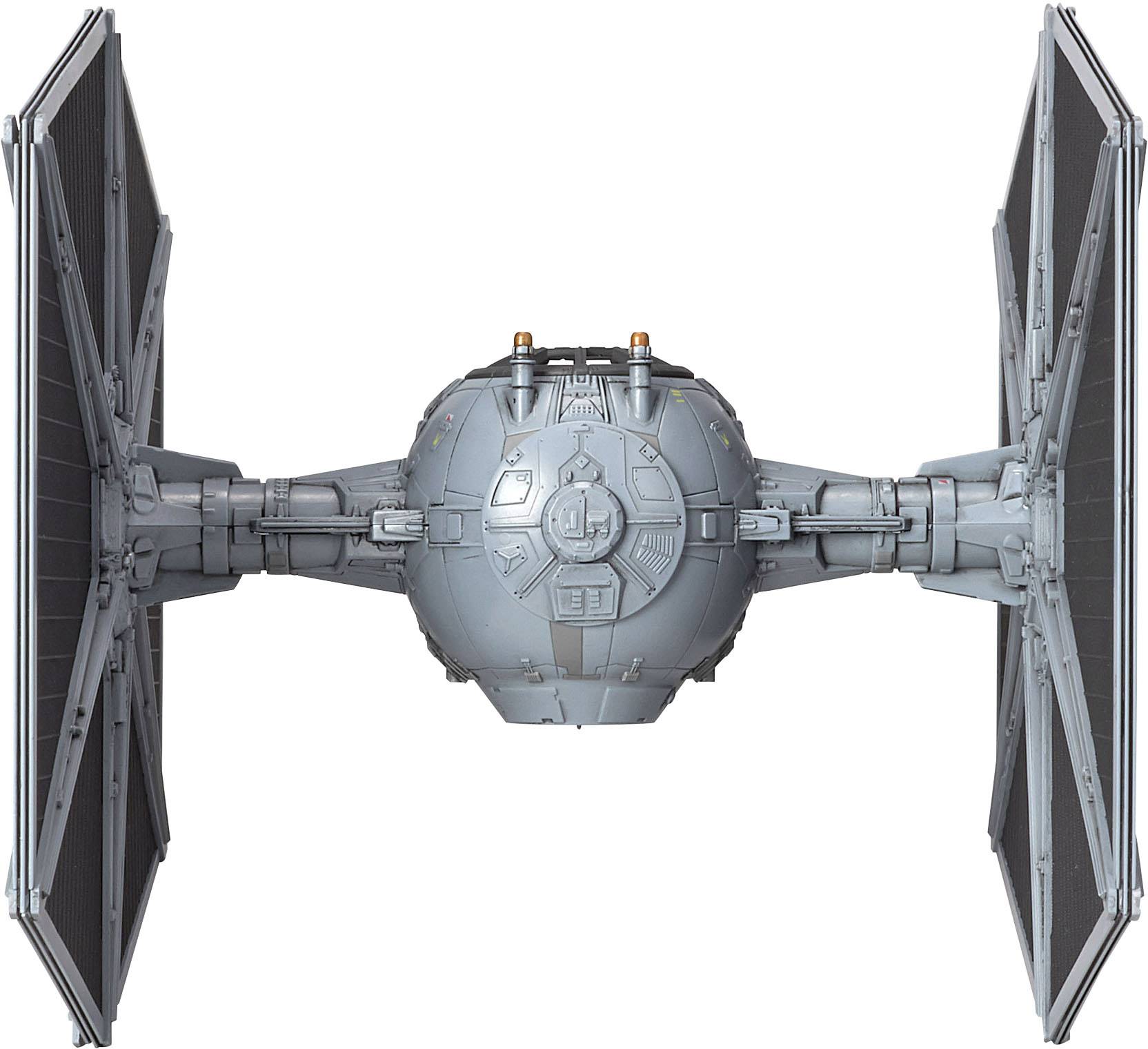 Un vaisseau spatial gris avec de grandes ailes en forme de panneaux de chaque côté, conçu dans un style futuriste et fictif.