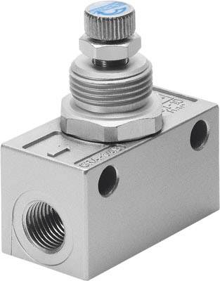 Vanne hydraulique métallique avec bouton rotatif sur le dessus. Forme rectangulaire avec plusieurs orifices de raccordement pour diverses applications.