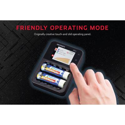 Un doigt touche un chargeur avec deux piles AA et un écran. Texte en haut : 'MODE DE FONCTIONNEMENT CONVIVIAL'.