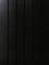 Motif abstrait noir avec des lignes verticales.