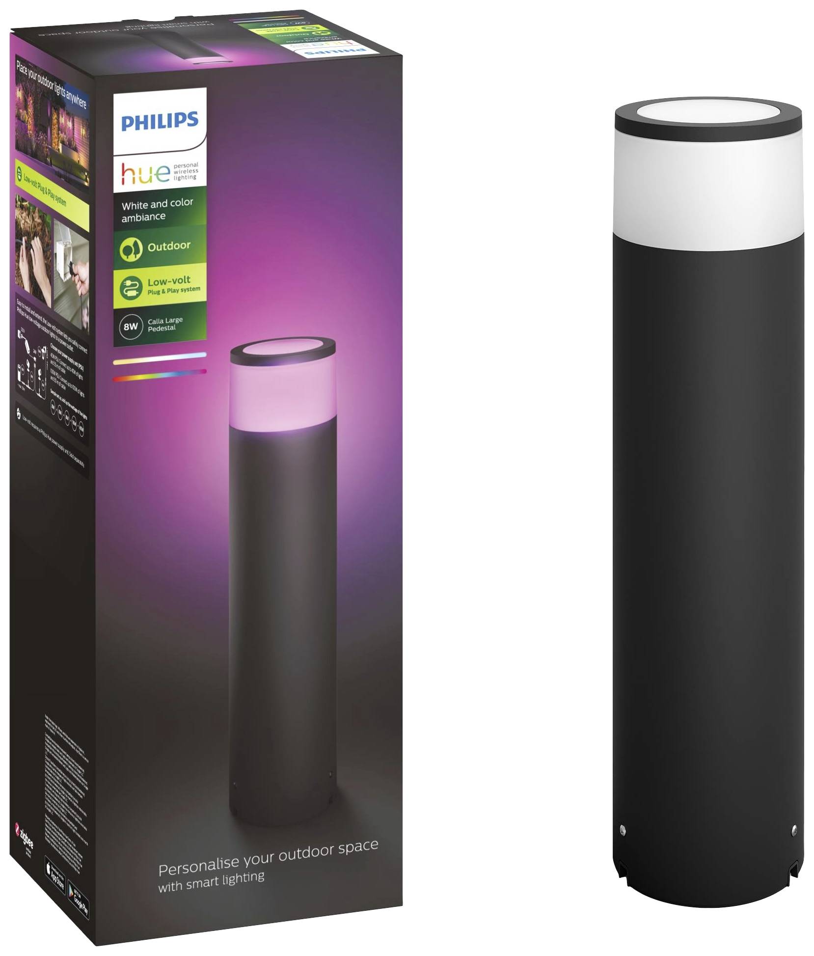 Une borne lumineuse Philips Hue avec un boîtier noir, dans un carton avec un indicateur d'éclairage coloré. Texte sur l'emballage : « Outdoor, Low volt. »