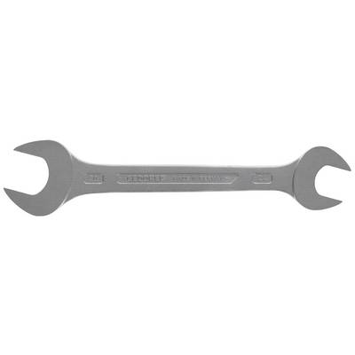 Une clé à double fourche en métal, marquée des tailles 17 mm et 19 mm, est posée horizontalement.