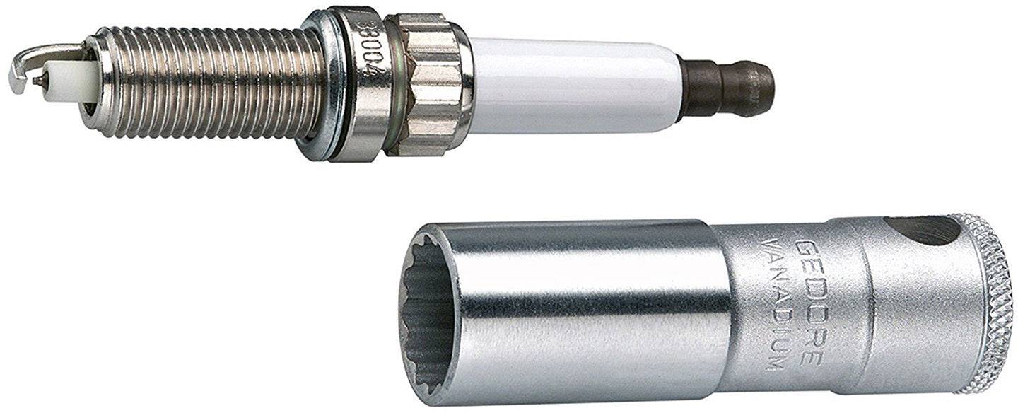Deux objets : une bougie d'allumage en haut et une clé à bougie en bas, tous deux en métal. La bougie d'allumage possède un filetage et une électrode.