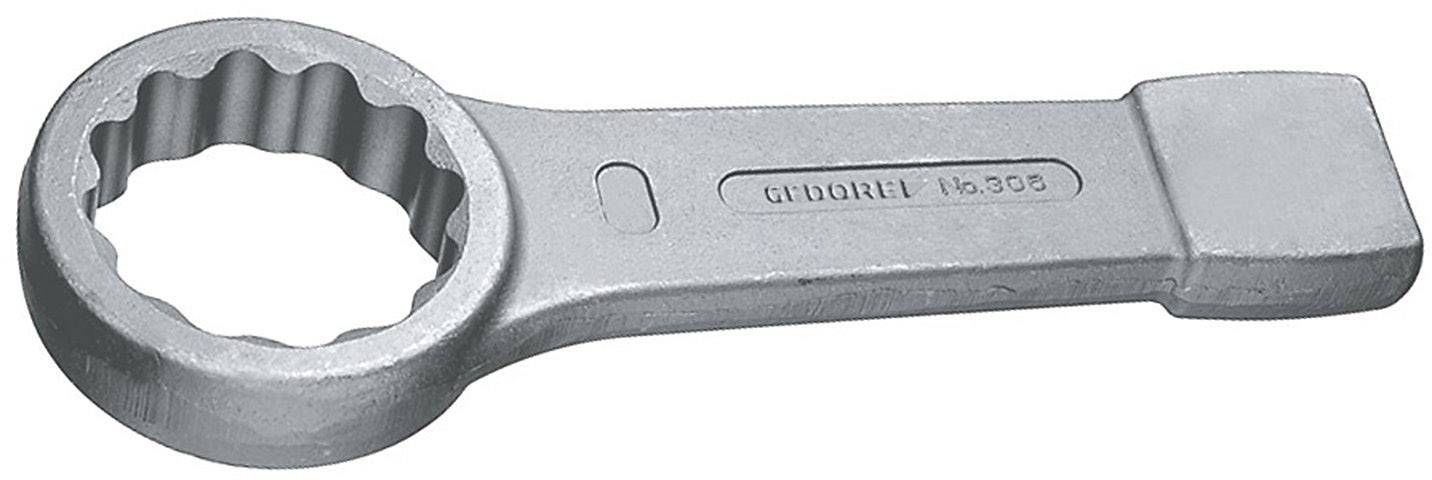 Une clé à fourche en argent à profil denté rond, utilisée pour desserrer ou serrer des écrous et des boulons.