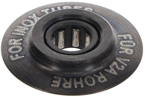 Un anneau métallique avec un texte gravé : « FOR ROHR » et « FOR WUX TUBES ». Au centre se trouve une petite pièce cylindrique.