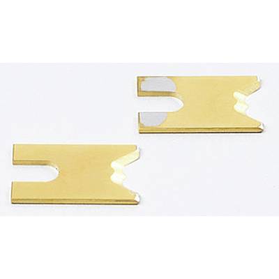 Deux lames dorées aux bords dentelés reposent sur une surface blanche.