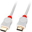 Un câble HDMI blanc avec des fiches dorées et des repères rouges sur les connecteurs.